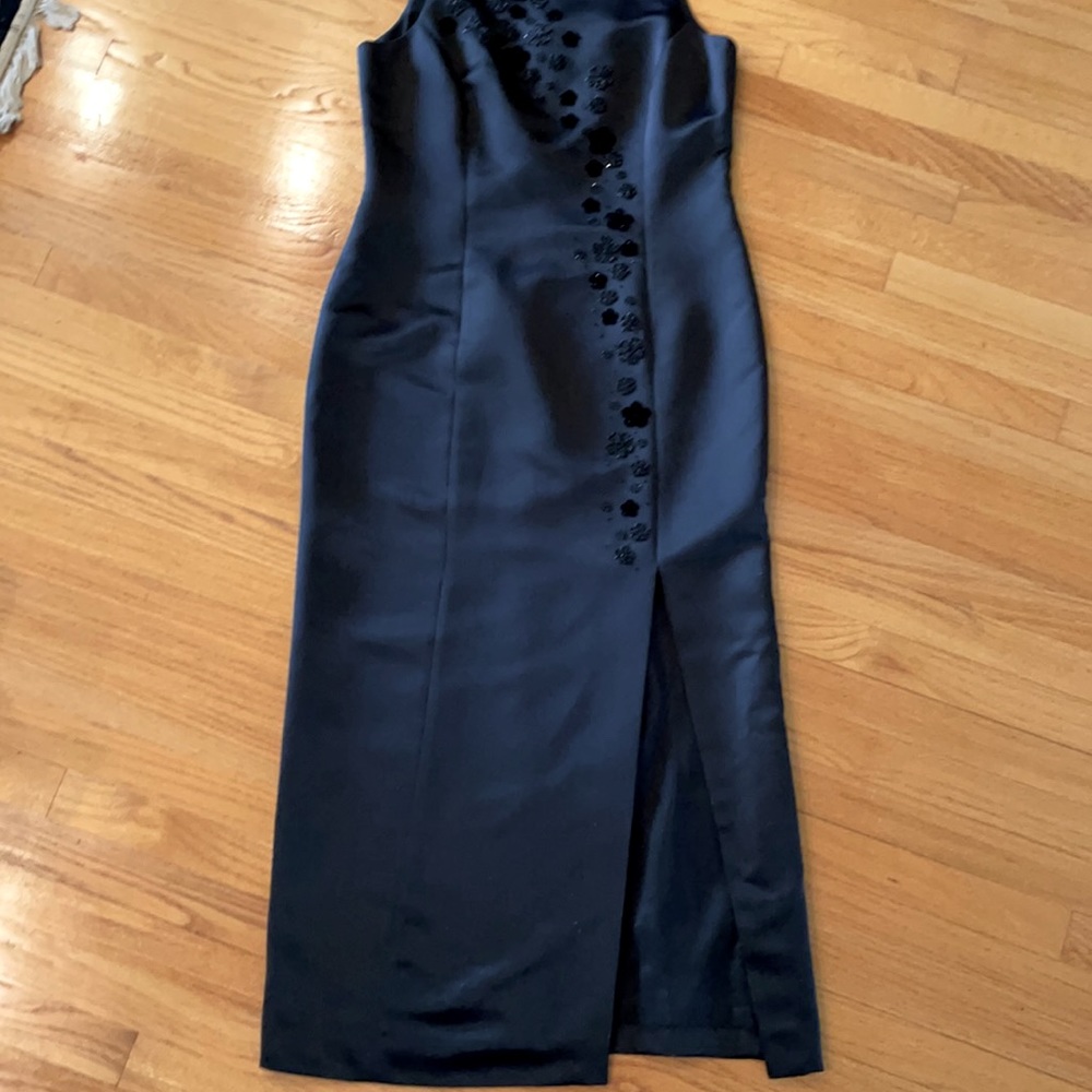 Black Satin maxi dress. Extremely elegant.